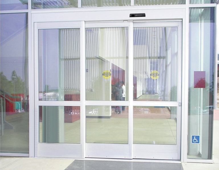 Exterior view of accessible automatic glass tri-part door